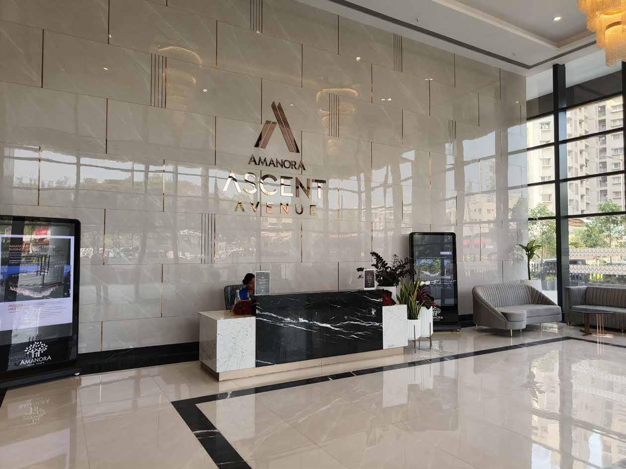 Ascent Avenue entrance lobby with Amanora branding